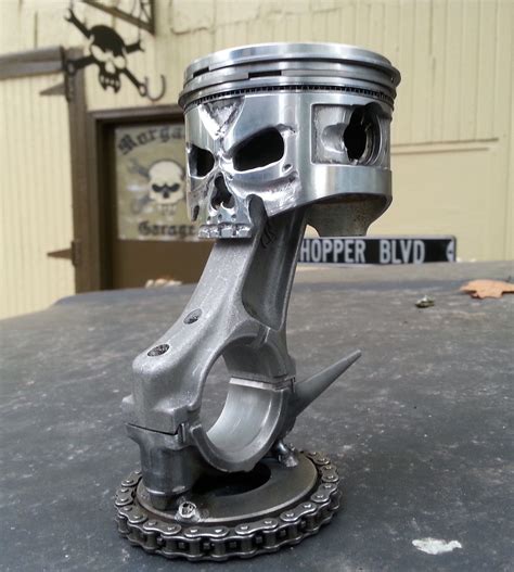 custom engine parts metal art|scrap metal pistons art.